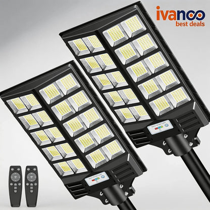 Two LED street lights with remote controls on a gray background, featuring the ivanco brand.