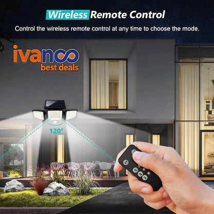 Hand holding a wireless remote control with outdoor setting and ivanco branding.
